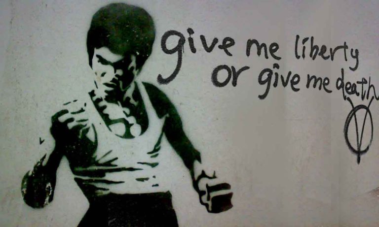 A Bruce Lee wall stencil from Tbilisi, Georgia overlapped with a graffitti from a wall in Hong Kong (Credit: Studio Incendo and Giga Paitchadze. Licensed under the Creative Commons Attribution 2.0 Generic license)